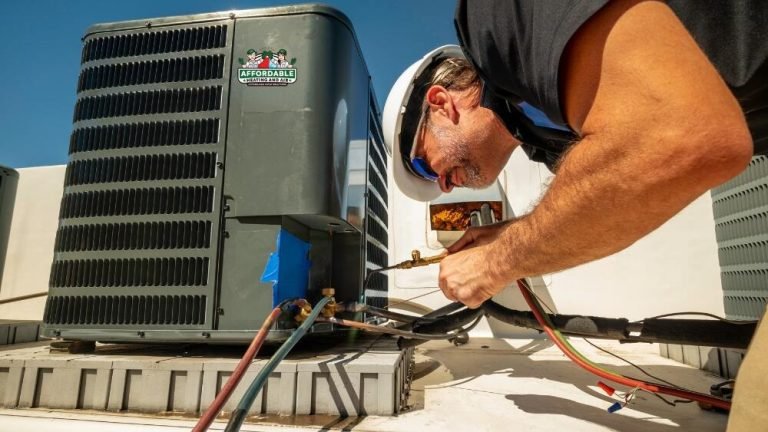 Affordable Heating and Air Technician repairs an HVAC unit in Glendale.