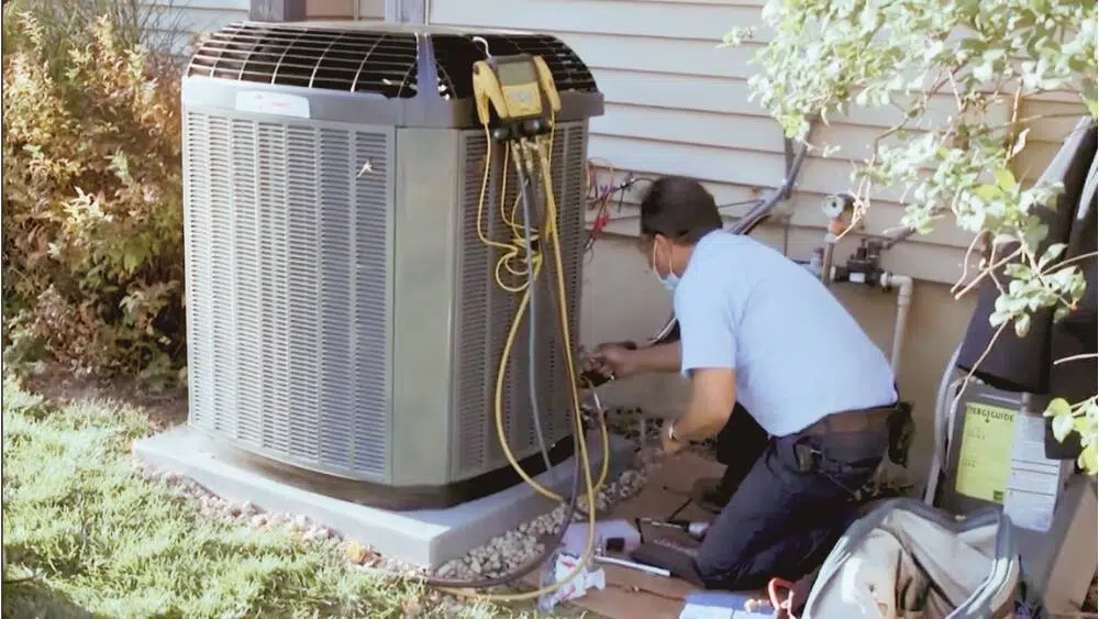 Using diagnostic tools, Affordable Heating and Air's experts perform heat pump services on the outdoor unit in Glendale, CA.