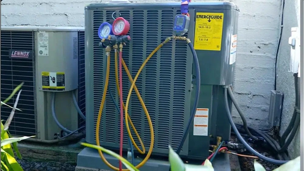 A heat pump is serviced with pressure gauges in Glendale, CA