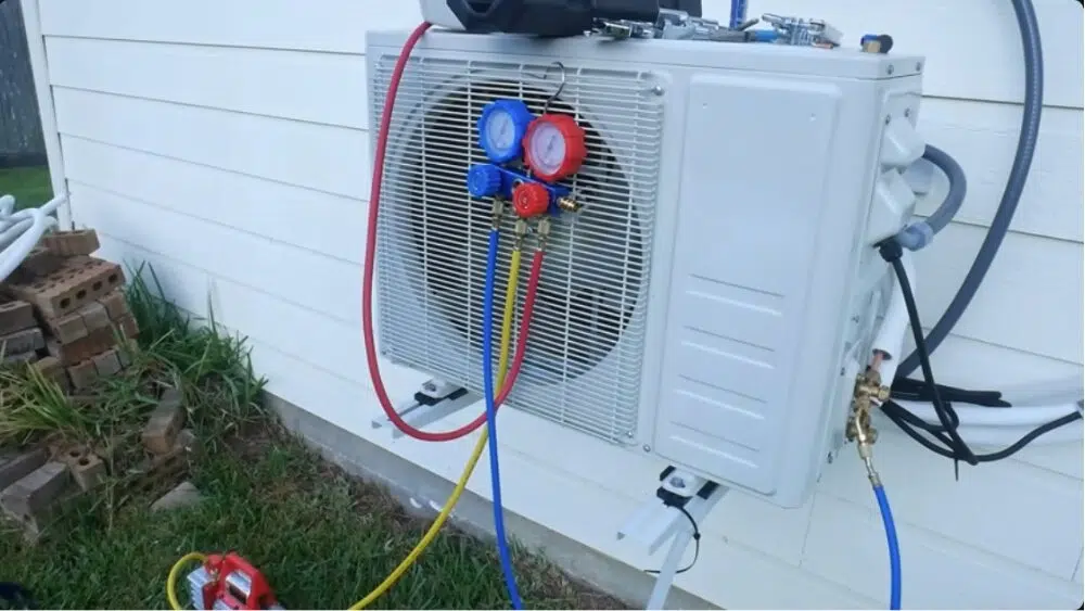 Affordable Heating and Air’s technician performing an AC upgrade with professional tools in Beverly Hills, CA.