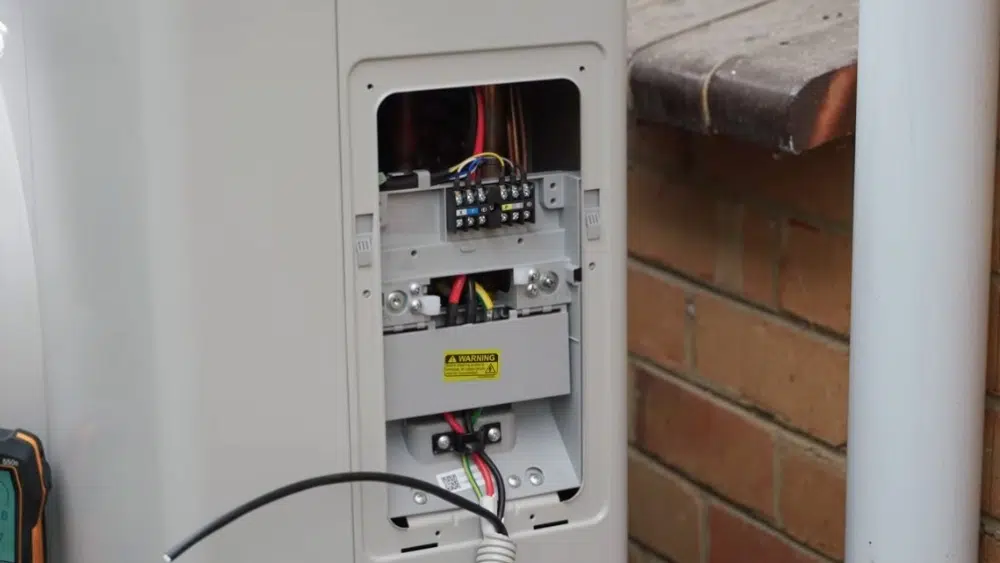 Commercial HVAC contractors in Beverly Hills installing a high-efficiency HVAC system.