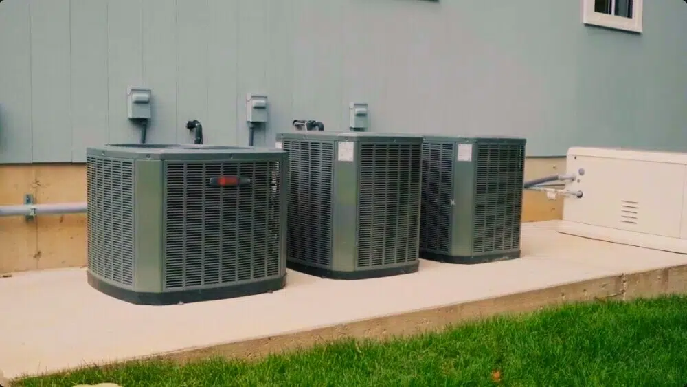 Three air conditioning units ready for same-day HVAC service and 24-hour emergency repair outside a Santa Monica residence.