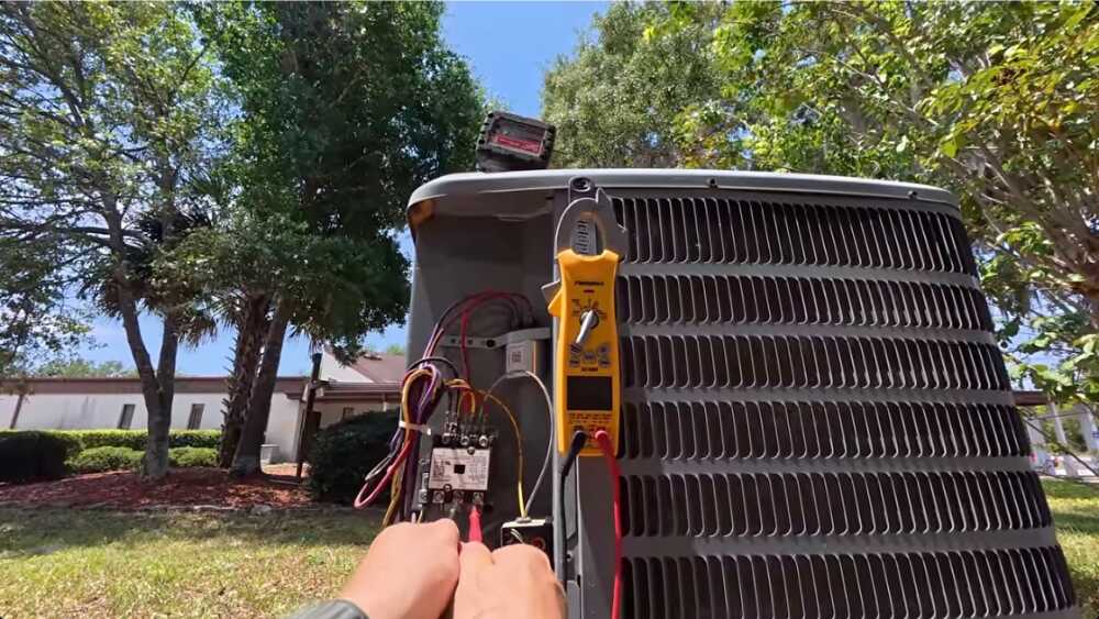 Affordable Heating and Air technician testing central air conditioner during same-day AC repair in Santa Clarita, CA