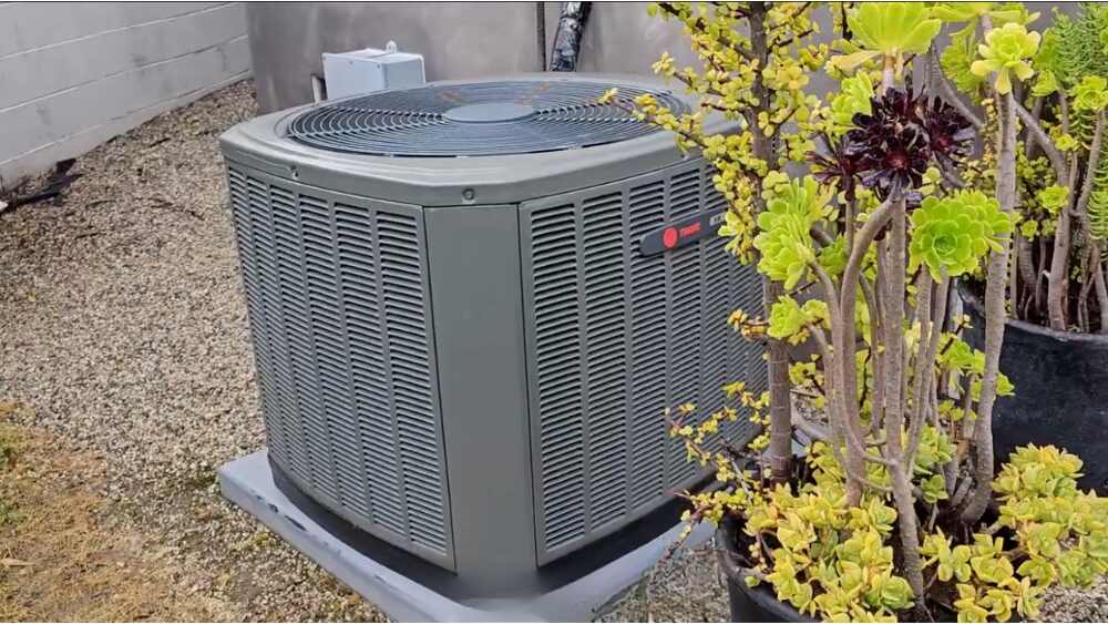 Residential heat pump during routine Heating maintenance service in Los Angeles County.