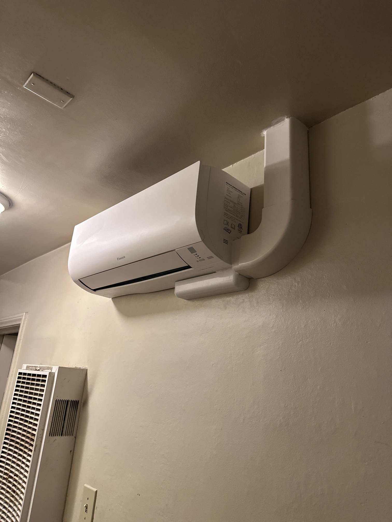 Wall-mounted mini-split system setup in Sherman Oaks, CA