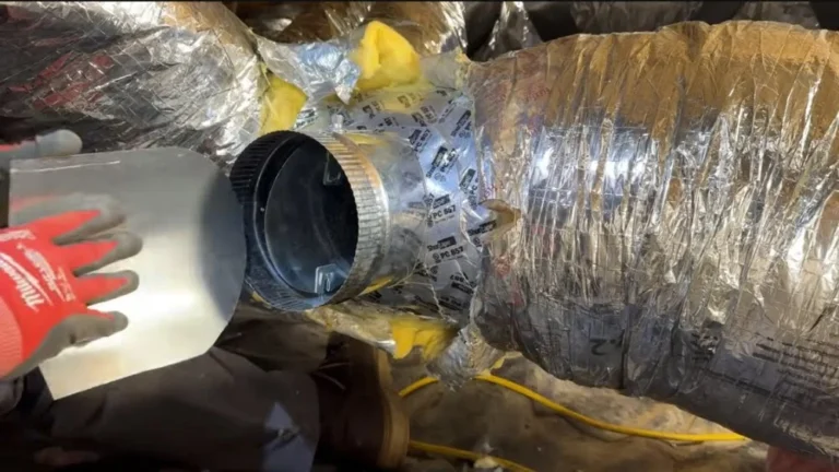 Close-up of duct repair in Los Angeles with sealed HVAC duct connection.