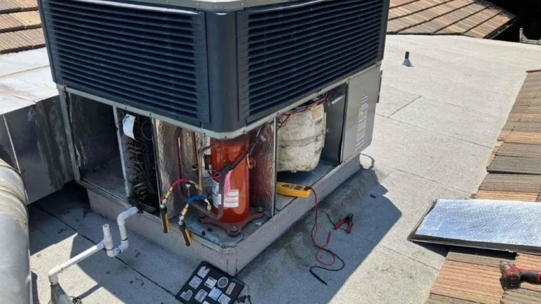 Rooftop commercial air conditioning unit undergoing emergency inspection and repair service in Granada Hills