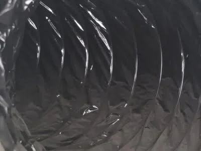 Clean flexible air duct interior photographed after professional vacuuming at a Reseda CA.