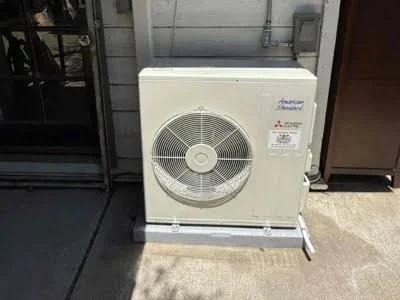 New outdoor condenser installation for residential HVAC system in Topanga CA.
