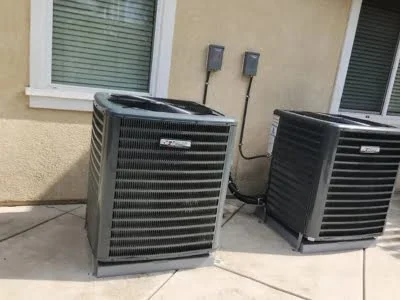 New outdoor AC condenser installation completed in Woodland Hills CA by Affordable Heating and Air.