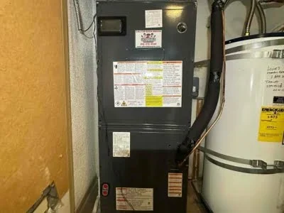 New heat pump air handler installed in a Porter Ranch CA utility closet by Affordable Heating and Air