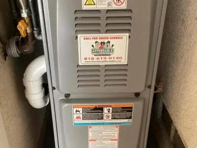 New gas furnace installed with gas line connection in Santa Clarita CA by Affordable Heating and Air.